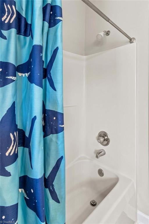 159 Forest Abbey Ln, China Grove, NC 28023 - bathroom featuring shower / bath combo with shower curtain