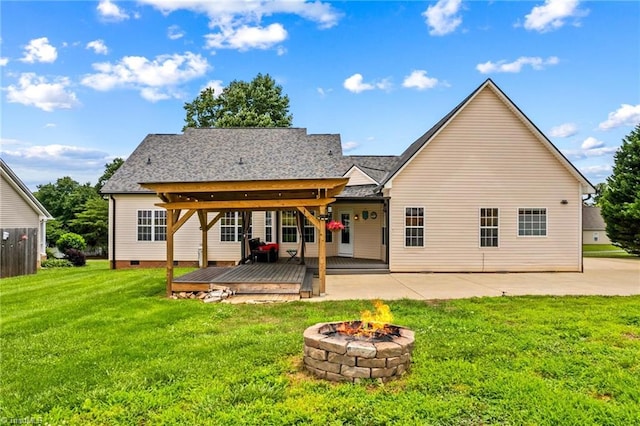 159 Forest Abbey Ln, China Grove, NC 28023 - back of house featuring a fire pit, a deck, a yard, crawl space, and a shingled roof