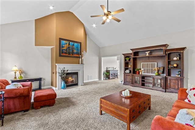 159 Forest Abbey Ln, China Grove, NC 28023 - carpeted living room featuring a ceiling fan, high vaulted ceiling, and a glass covered fireplace