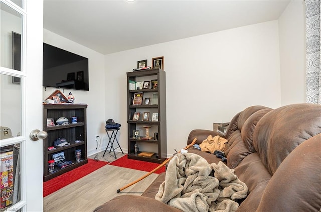 living room with light hardwood / wood-style floors