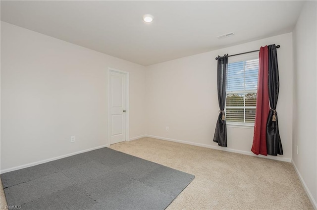 view of carpeted spare room