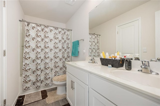 full bathroom featuring vanity, toilet, shower / bath combination with curtain, and wood-type flooring