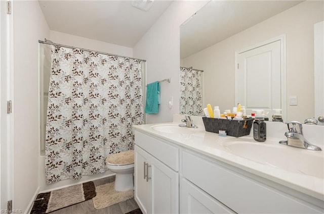 417 Daniel Dr, Lexington, NC 27295 - full bathroom with toilet, double vanity, and shower / bath combo with shower curtain