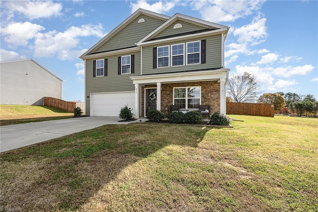 view of front of home featuring a front lawn and a garage