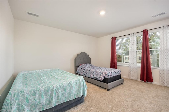 bedroom featuring carpet