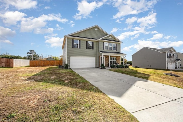 view of front of property featuring a front lawn and a garage