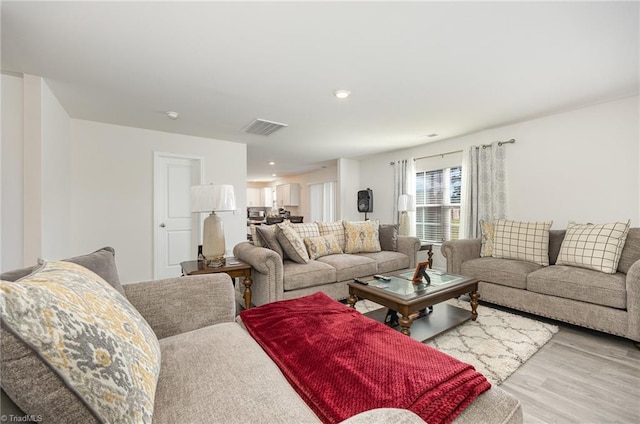 living room featuring light hardwood / wood-style floors