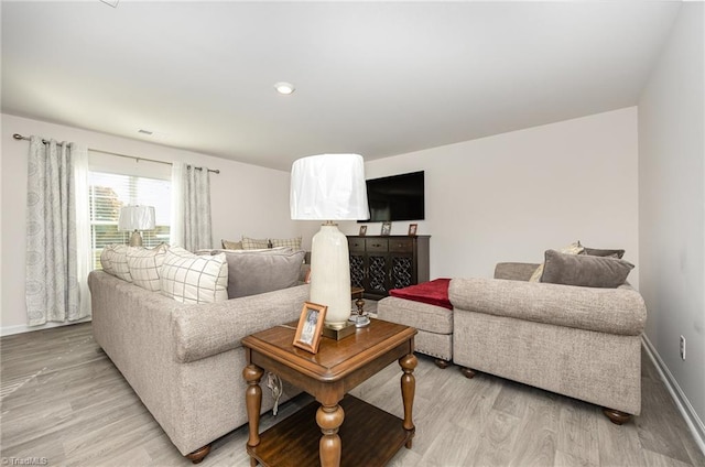 living room featuring light hardwood / wood-style floors