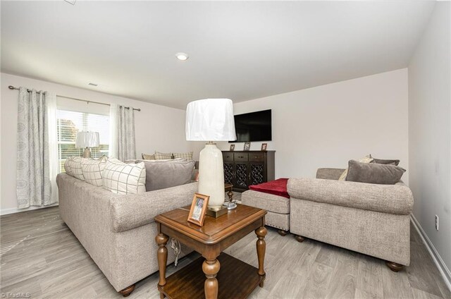 417 Daniel Dr, Lexington, NC 27295 - living area with light wood-style flooring and baseboards