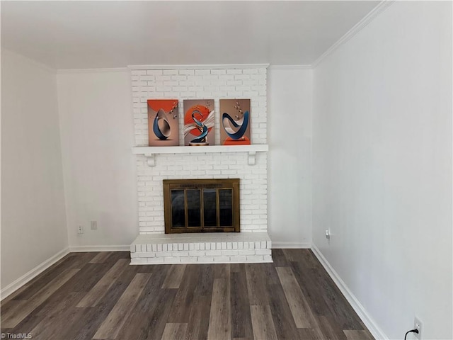 1427 Westwood Ln, Wilkesboro, NC 28697 - unfurnished living room featuring wood finished floors, crown molding, baseboards, and a brick fireplace