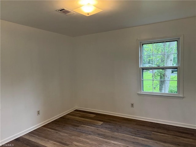 1427 Westwood Ln, Wilkesboro, NC 28697 - spare room featuring dark wood-type flooring and baseboards