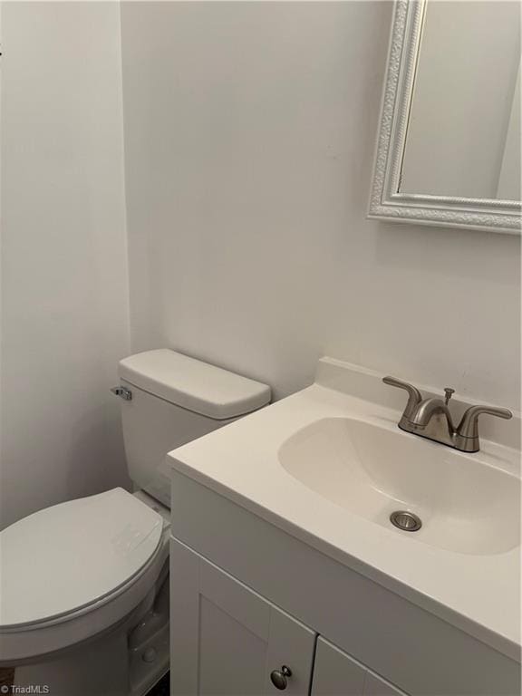 1427 Westwood Ln, Wilkesboro, NC 28697 - half bathroom with vanity and toilet