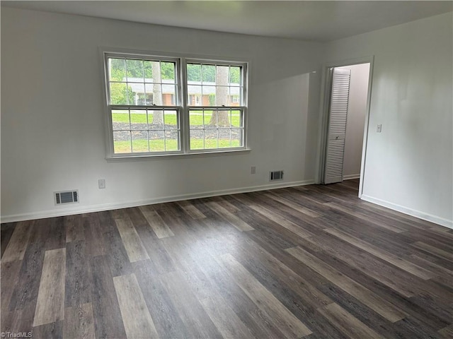 1427 Westwood Ln, Wilkesboro, NC 28697 - empty room with dark wood-style floors and baseboards