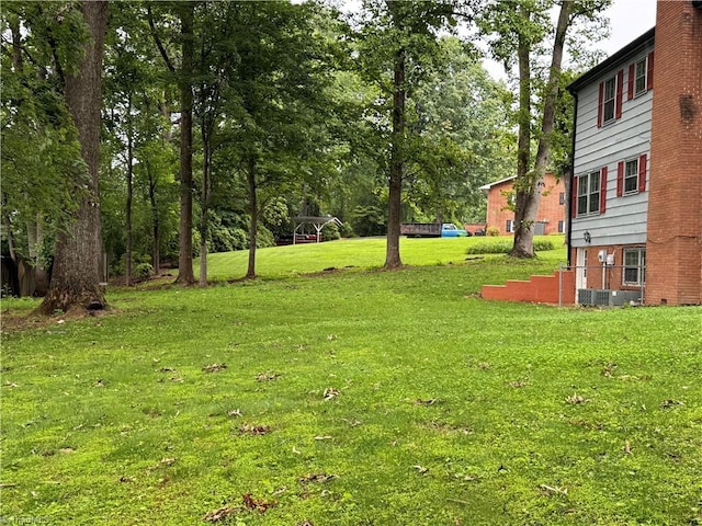 1427 Westwood Ln, Wilkesboro, NC 28697 - view of grassy yard featuring view of wooded area