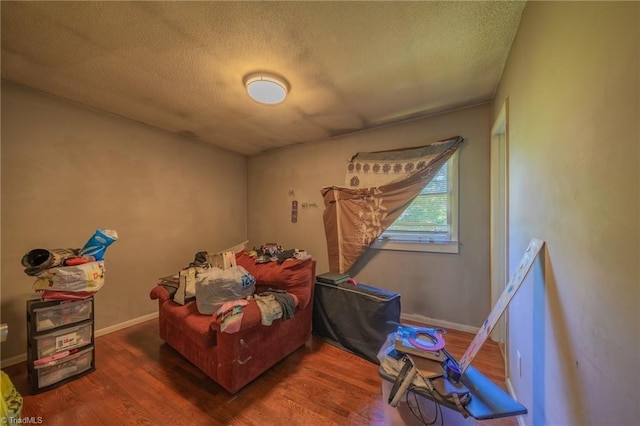 157 Blaze St, Winston-Salem, NC 27105 - bedroom featuring wood finished floors and a textured ceiling