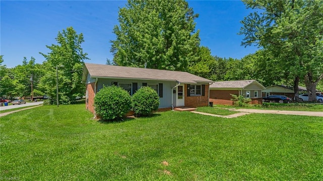 157 Blaze St, Winston-Salem, NC 27105 - single story home with a front lawn and brick siding