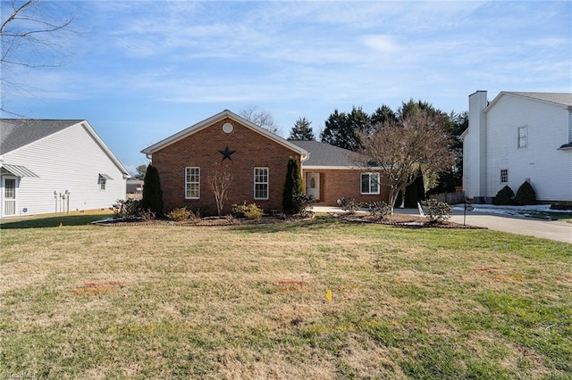 view of front of home with a front yard