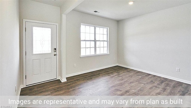 foyer entrance with dark wood-type flooring