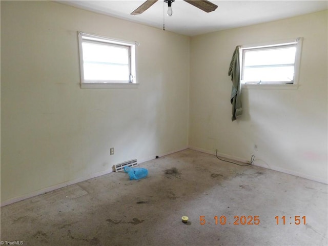 314 S Mccallum St, Candor, NC 27229 - empty room with plenty of natural light, a ceiling fan, and baseboards
