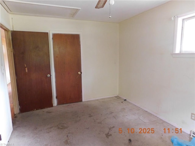 314 S Mccallum St, Candor, NC 27229 - unfurnished bedroom featuring unfinished concrete floors and a ceiling fan