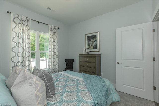 bedroom featuring visible vents and carpet floors