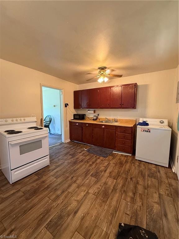 1611 Willow Rd, Greensboro, NC 27401 - kitchen with white electric range, washer / clothes dryer, dark wood-style flooring, ceiling fan, and light countertops
