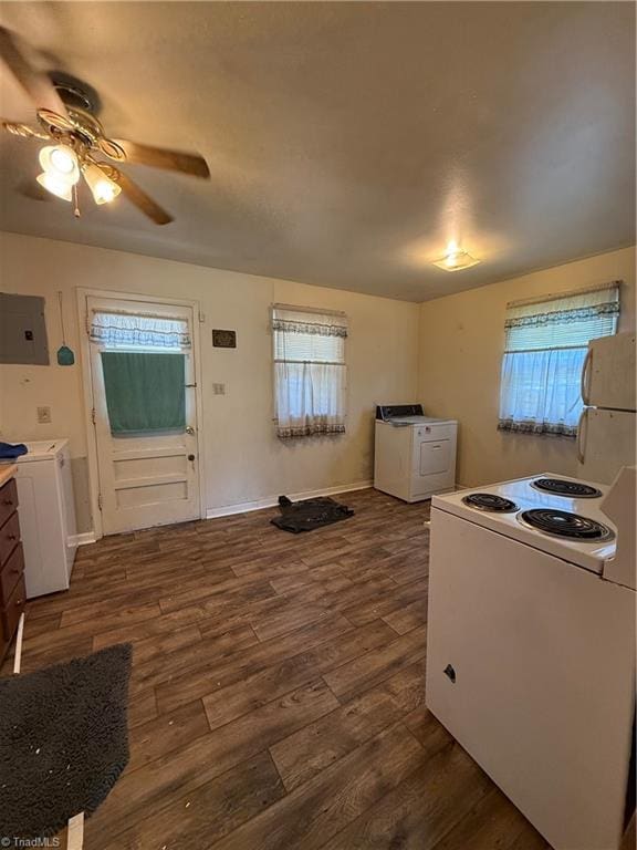 1611 Willow Rd, Greensboro, NC 27401 - kitchen with washer / dryer, white electric range oven, and dark wood-style flooring