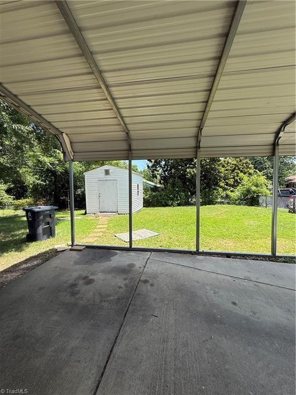1611 Willow Rd, Greensboro, NC 27401 - view of patio featuring a shed and a carport