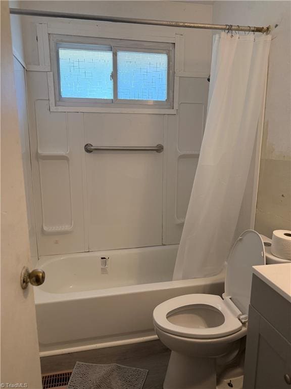 1611 Willow Rd, Greensboro, NC 27401 - full bathroom with vanity and shower / bath combo with shower curtain