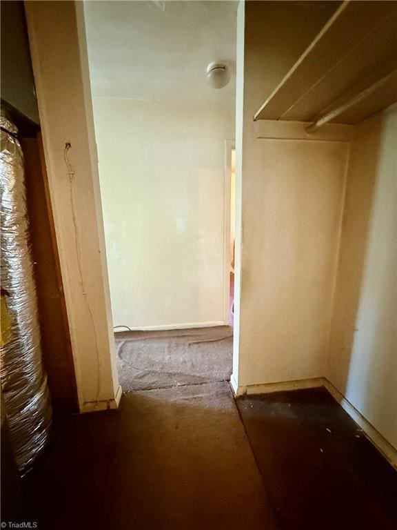 1611 Willow Rd, Greensboro, NC 27401 - corridor with baseboards and carpet flooring
