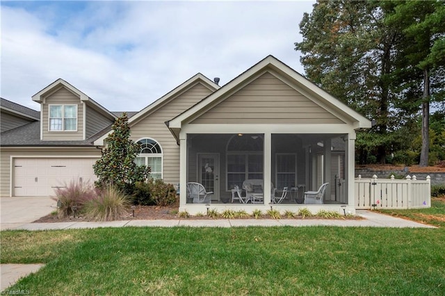 view of front facade featuring a front lawn and a sunroom