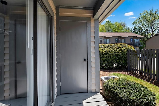 property entrance featuring fence