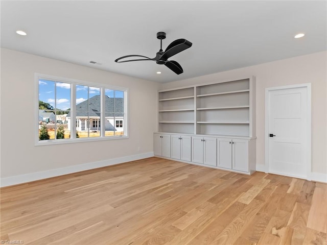 interior space featuring recessed lighting, a ceiling fan, visible vents, baseboards, and light wood-type flooring