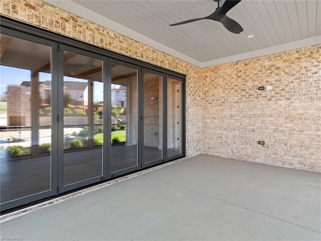 view of patio with ceiling fan