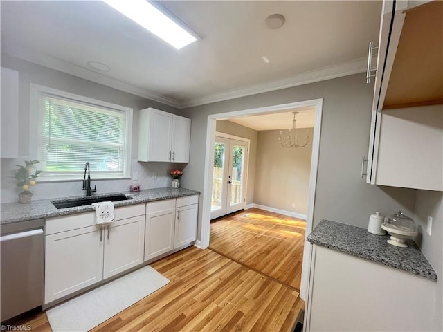 100 Petree Rd, Winston-Salem, NC 27106 - kitchen featuring stainless steel dishwasher, white cabinetry, french doors, light wood-style floors, and crown molding