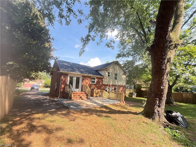 100 Petree Rd, Winston-Salem, NC 27106 - rear view of house featuring brick siding and french doors