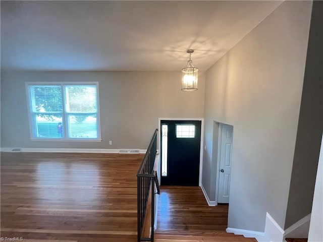 100 Petree Rd, Winston-Salem, NC 27106 - entrance foyer with wood finished floors, healthy amount of natural light, and a chandelier