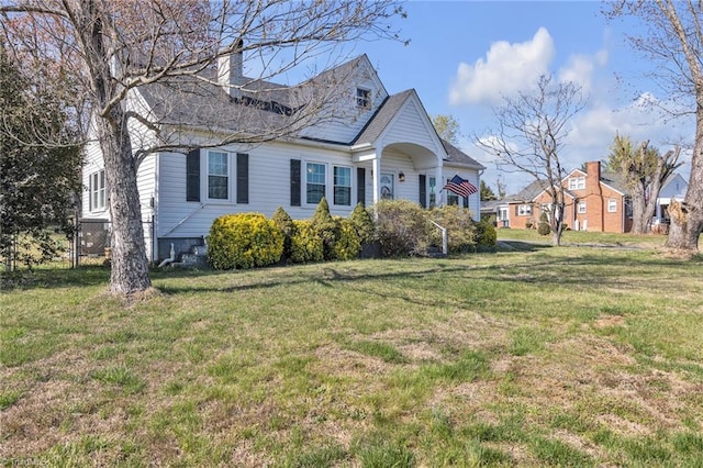 1109 Wildwood Rd NE, Lenoir, NC 28645 - view of front of home featuring a front lawn and a chimney