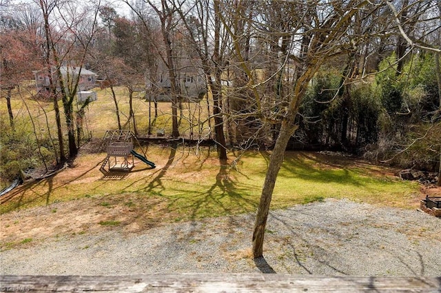 view of yard with a playground