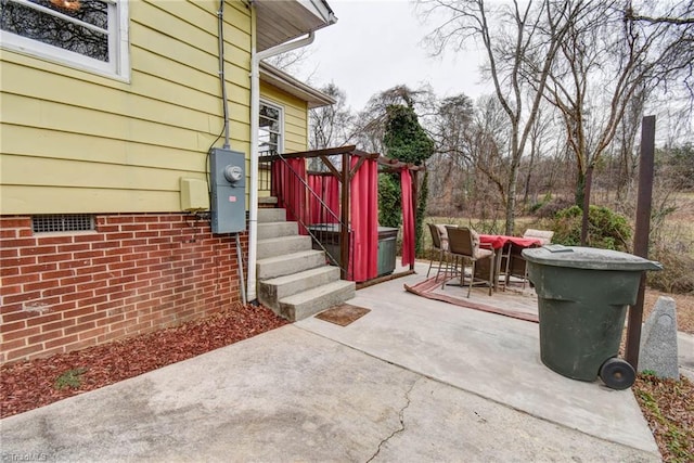 view of patio / terrace with a jacuzzi