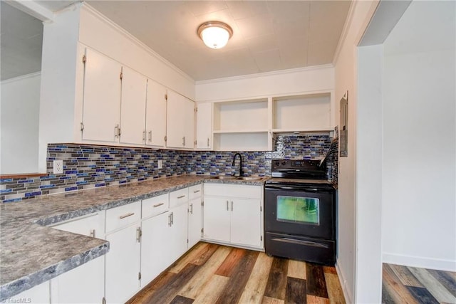 kitchen featuring sink, dark hardwood / wood-style floors, ornamental molding, white cabinets, and black range with electric cooktop