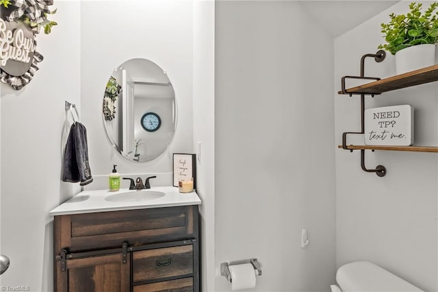 371 Royce Dr, Winston-Salem, NC 27107 - bathroom with vanity, vaulted ceiling, and toilet