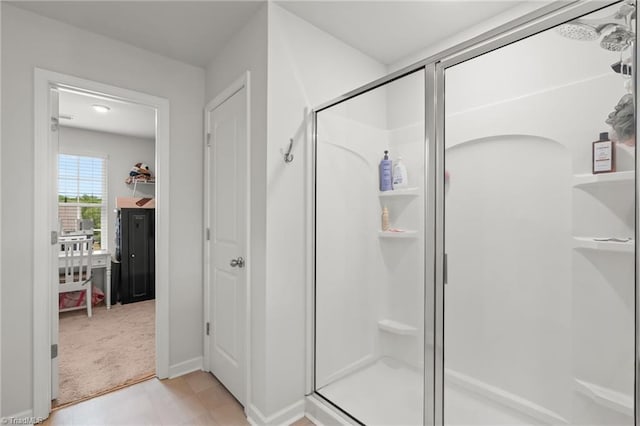 371 Royce Dr, Winston-Salem, NC 27107 - bathroom with baseboards and a stall shower