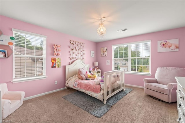 371 Royce Dr, Winston-Salem, NC 27107 - bedroom featuring an inviting chandelier, carpet floors, baseboards, and visible vents