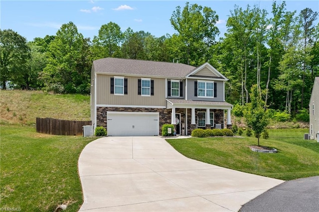 371 Royce Dr, Winston-Salem, NC 27107 - view of front of home featuring a porch, a garage, fence, concrete driveway, and stone siding