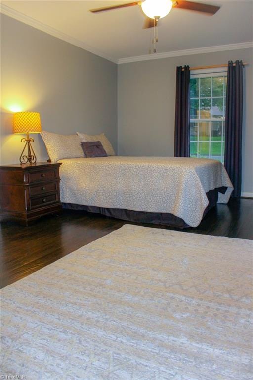 4503 Radnor Dr, Greensboro, NC 27410 - bedroom featuring wood finished floors, ornamental molding, and a ceiling fan