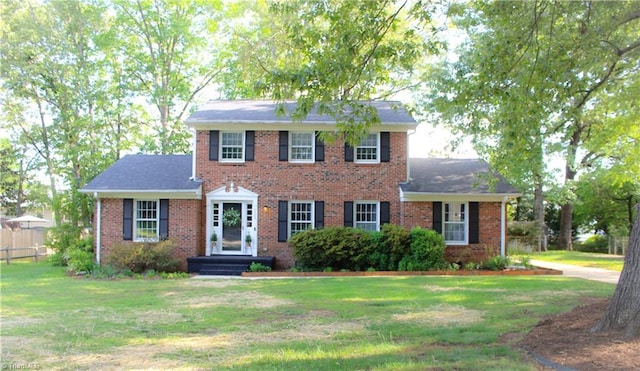 4503 Radnor Dr, Greensboro, NC 27410 - colonial-style house with brick siding