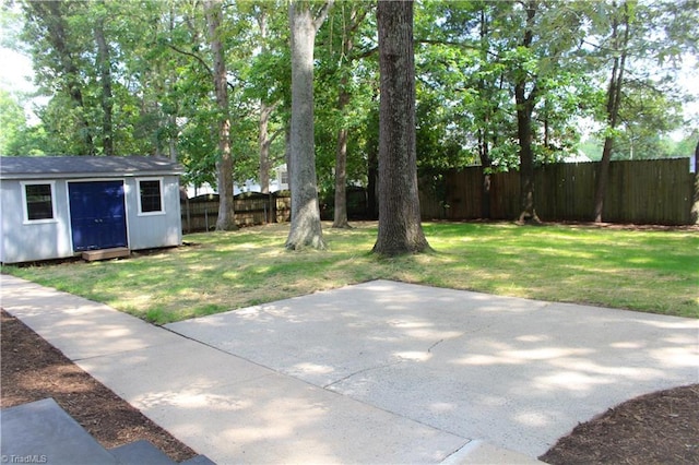 4503 Radnor Dr, Greensboro, NC 27410 - view of yard with a patio area and an outbuilding