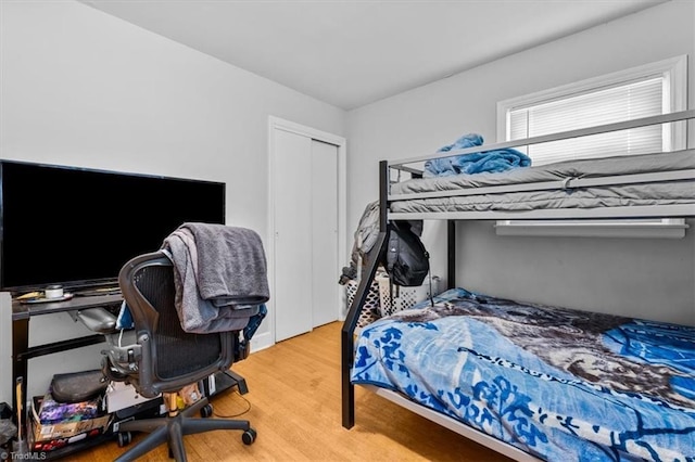 803 Buckner St, Graham, NC 27253 - bedroom featuring wood finished floors and a closet