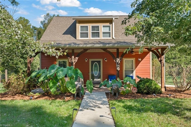 2108 Glenside Dr, Greensboro, NC 27405 - view of front of home with a porch, a front lawn, and a shingled roof
